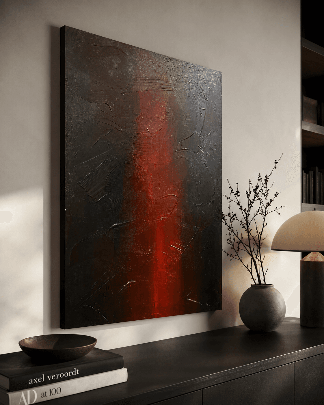 Ember Vein shown installed above a dark sideboard with dried branches and a bookshelf