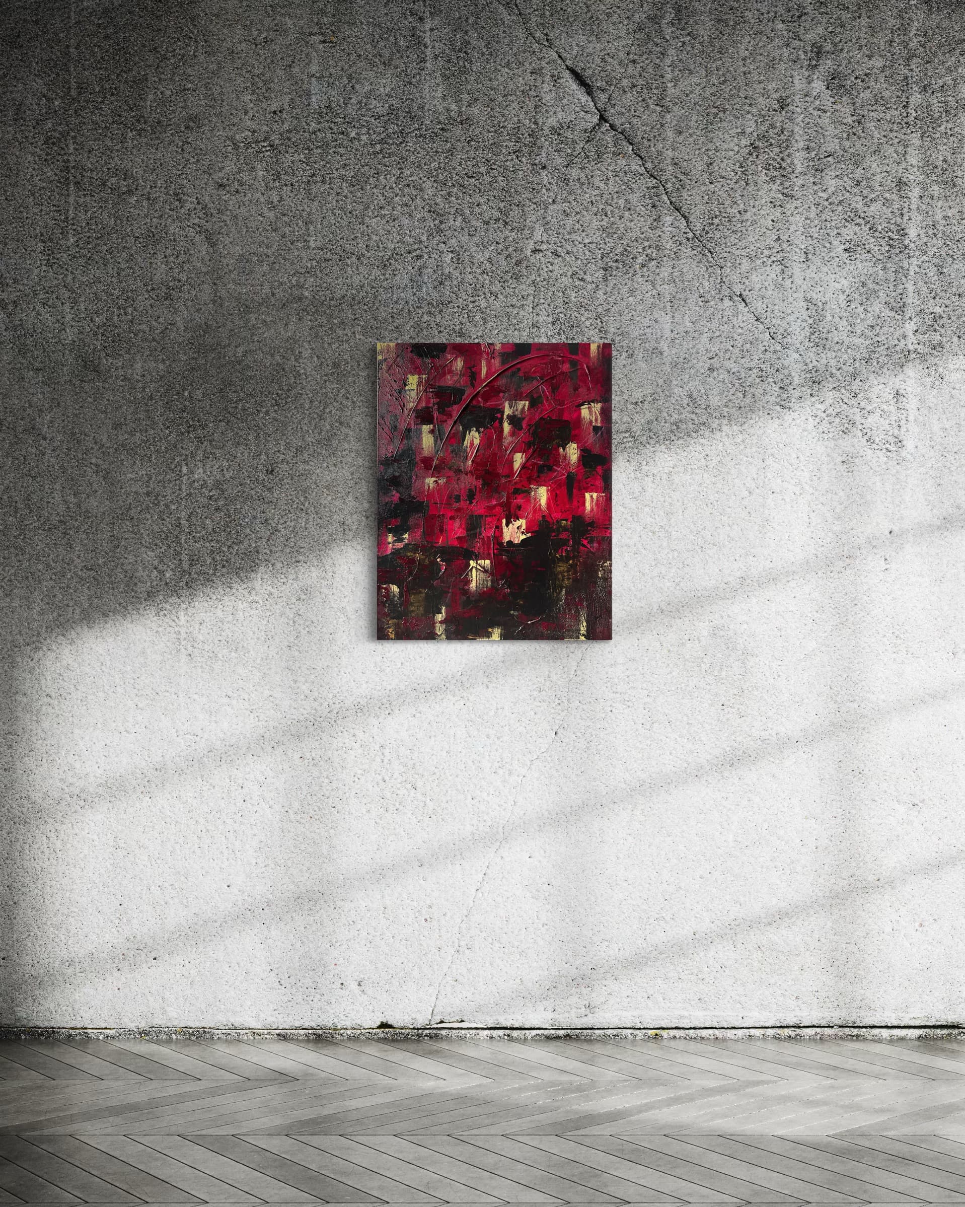 Crimson Echoes, a crimson, black, and gold abstract painting by Julia Mindar with a sweeping arc, shown on a concrete wall