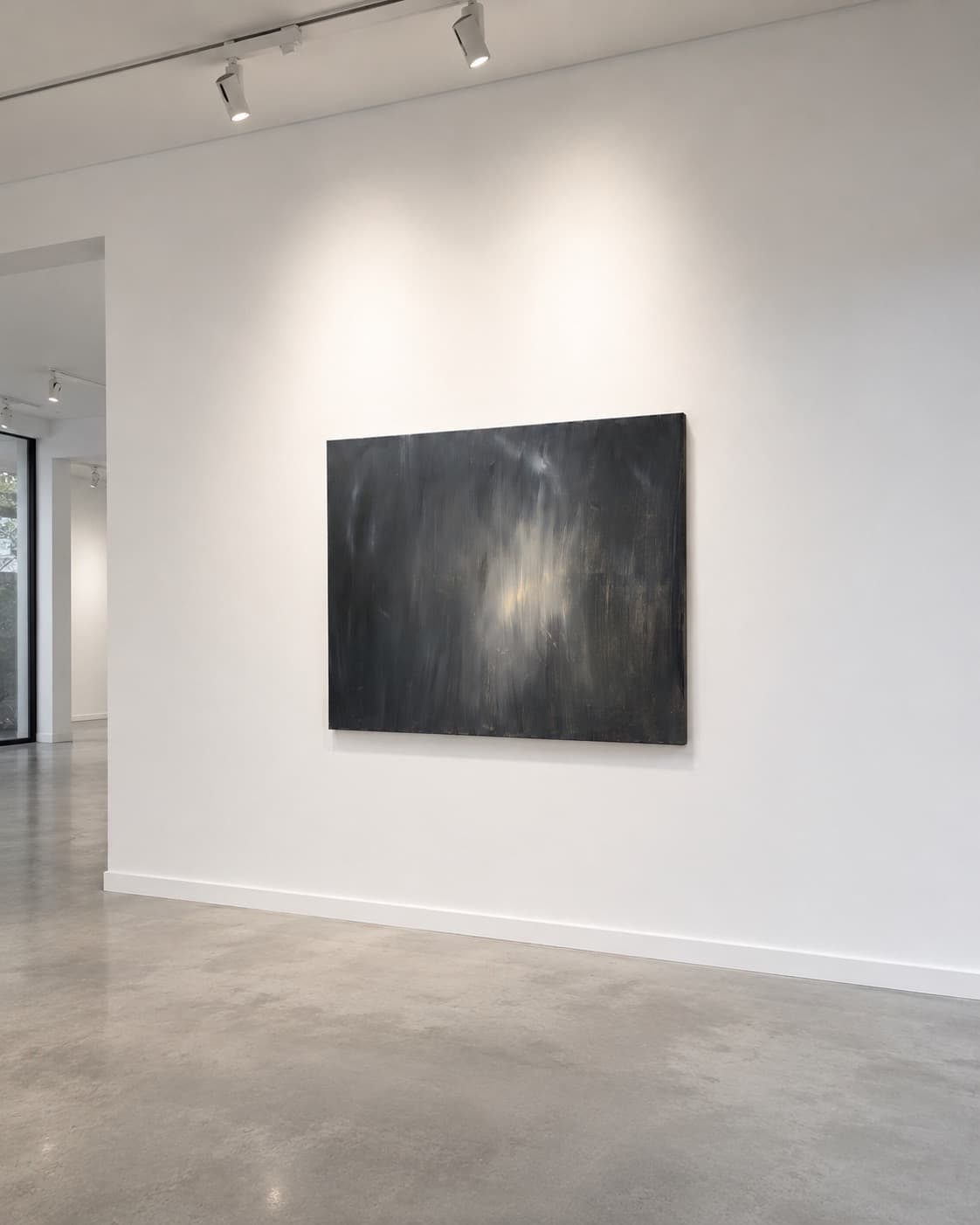 Veiled Light, a charcoal gray and smoky taupe abstract painting by Julia Mindar with a soft illuminated center, shown on a gallery wall